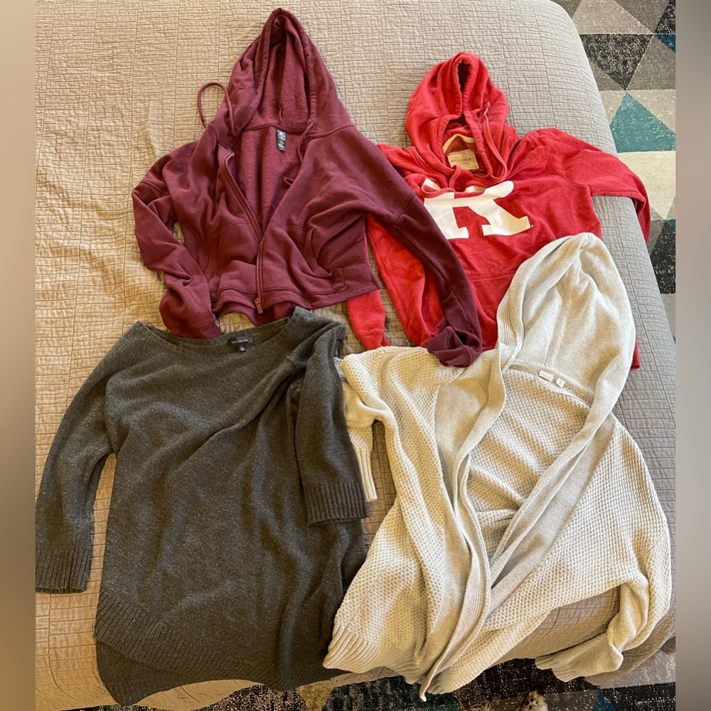 Group of four sweaters